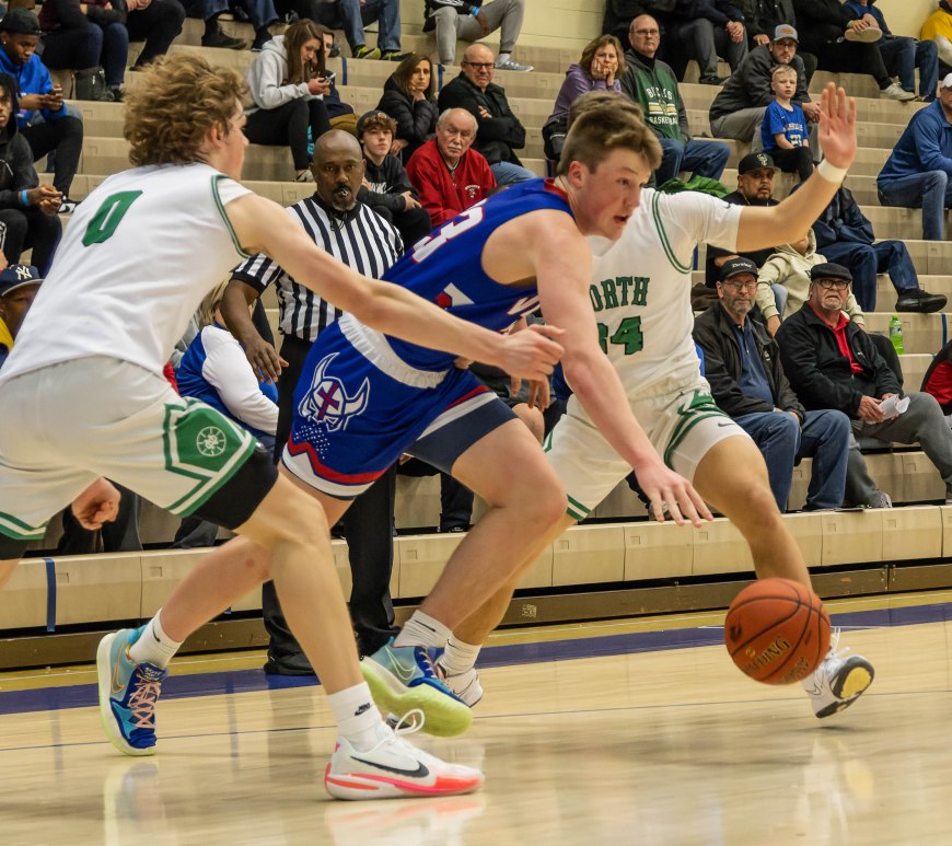Kon Knueppel dribbles out of a double team on the wing.