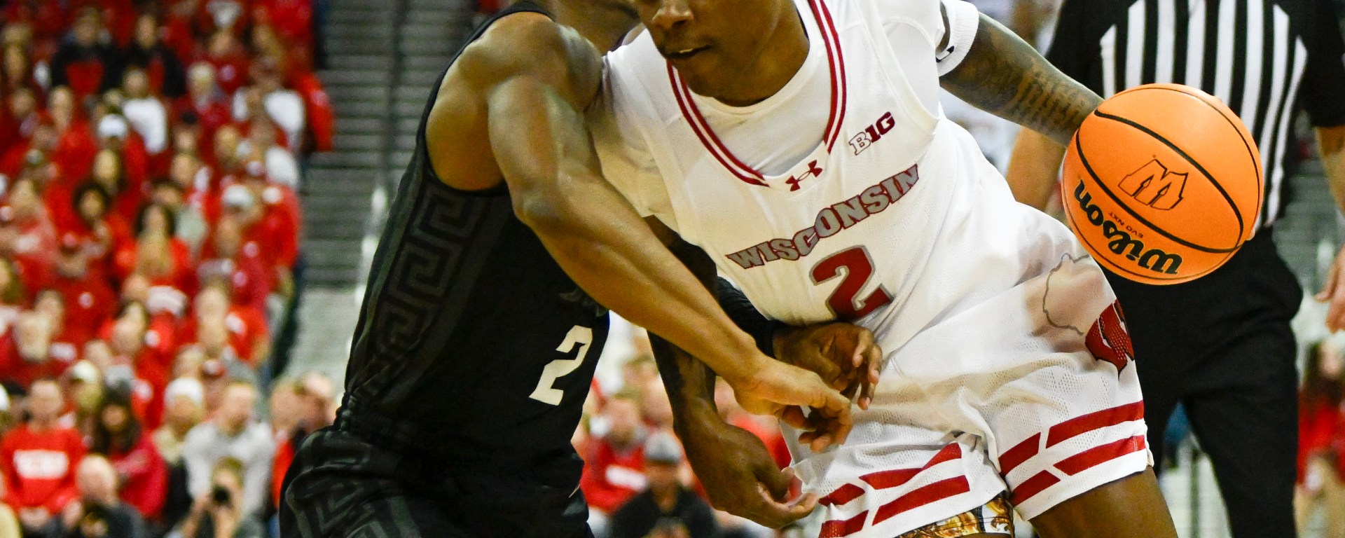 AJ Storr drives past a Michigan State defender.