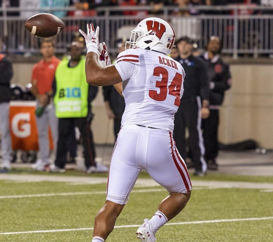 Jackson Acker hold his hands out to catch a ball during a game in 2022.