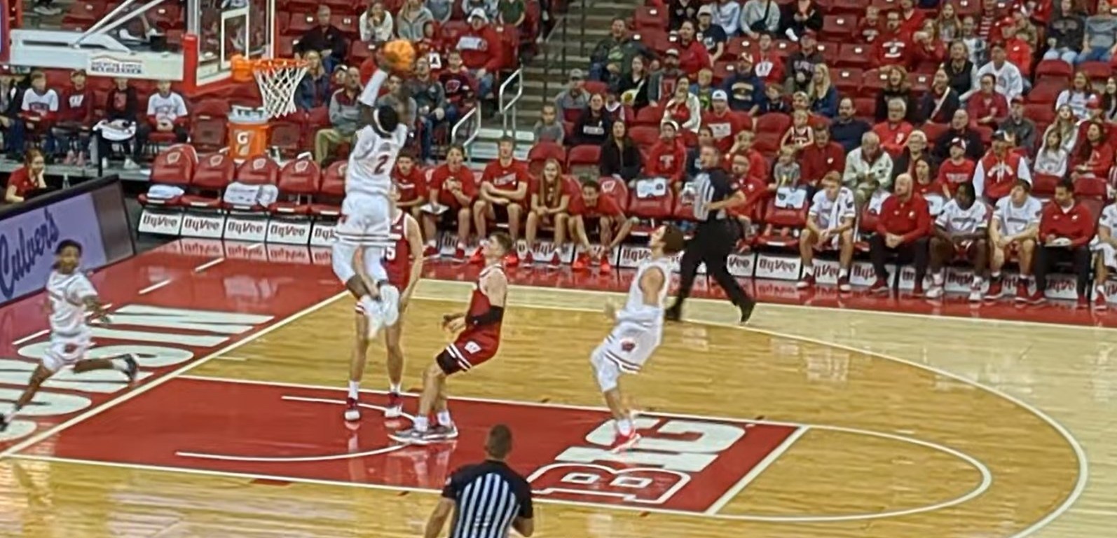 A photo of AJ Storr dunking in the Red and White Wisconsin Badgers Scrimmage at the Kohl Center on Sunday.