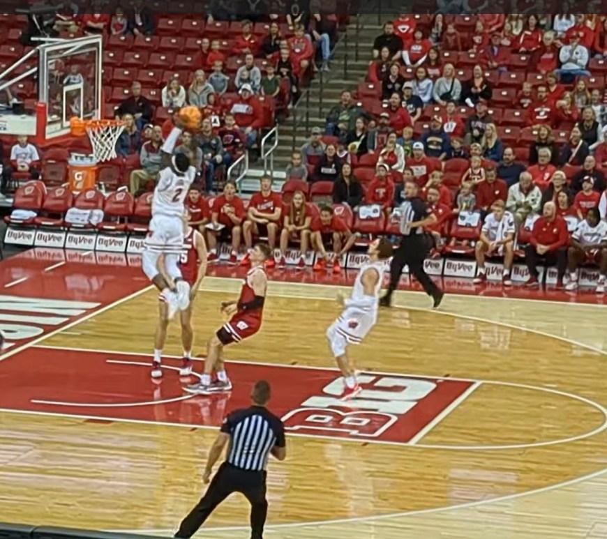 A photo of AJ Storr dunking in the Red and White Wisconsin Badgers Scrimmage at the Kohl Center on Sunday.