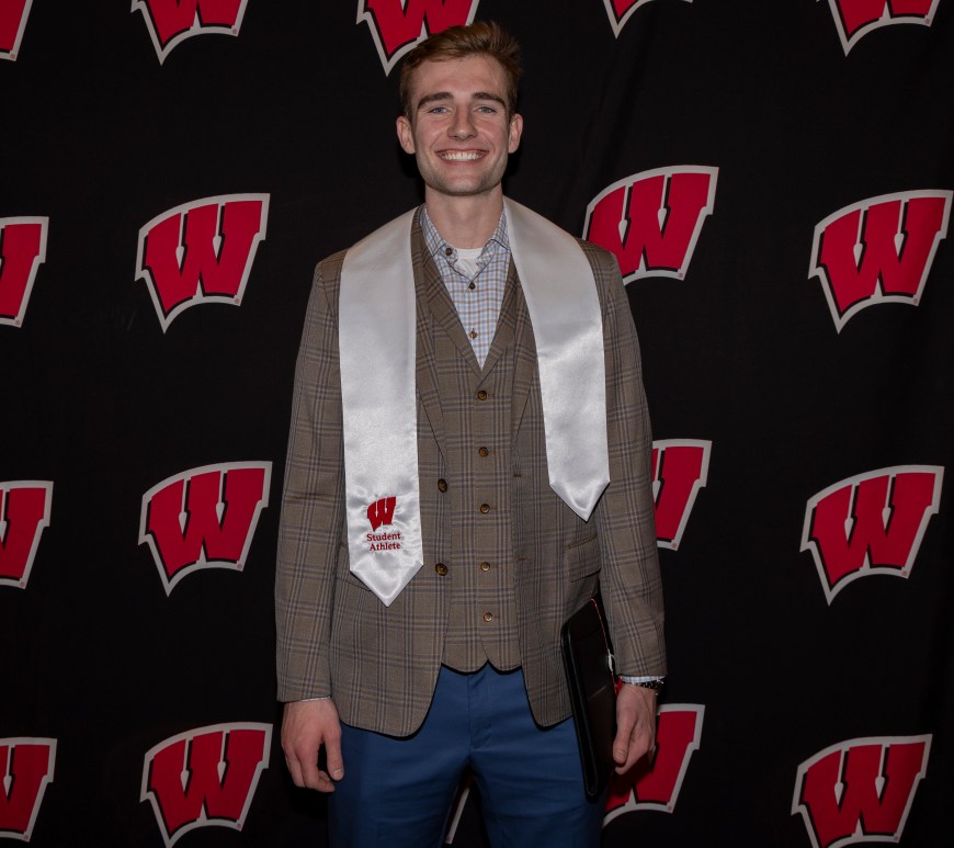A photo of Tyler Wahl after receiving his master's degree.